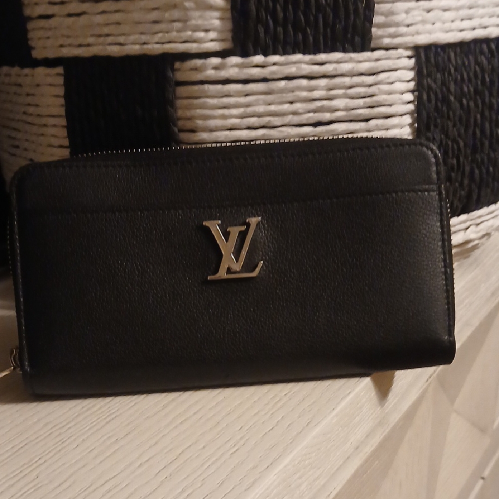 Louis Vuitton Black Wallet with Silver Logo